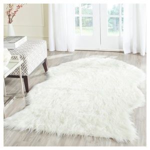 SAFAVIEH Faux Sheep Skin Rug (Size: 3' x 5' Color: IVORY)